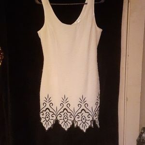 Gorgeous white mini dress with black detailing